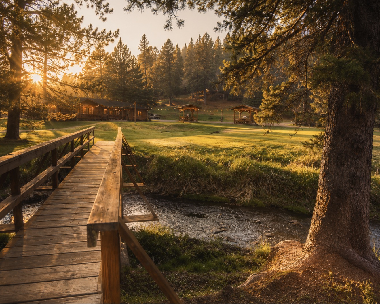 Wooden bridge over a creek at -385 Campground in the Black Hills